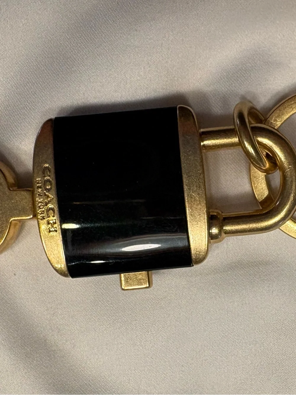 Coach Black and Gold Padlock & Key Keyring Duo
